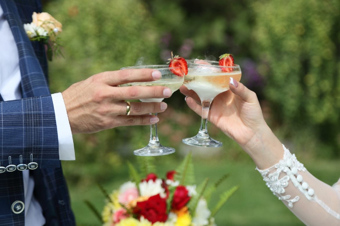 champagne-glasses-hands-newlyweds